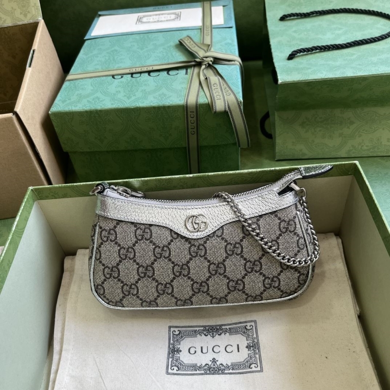 G*u*i top handle bags